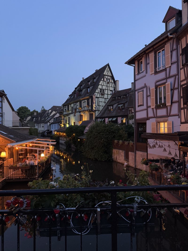 Half-timbered houses along the canal at dusk