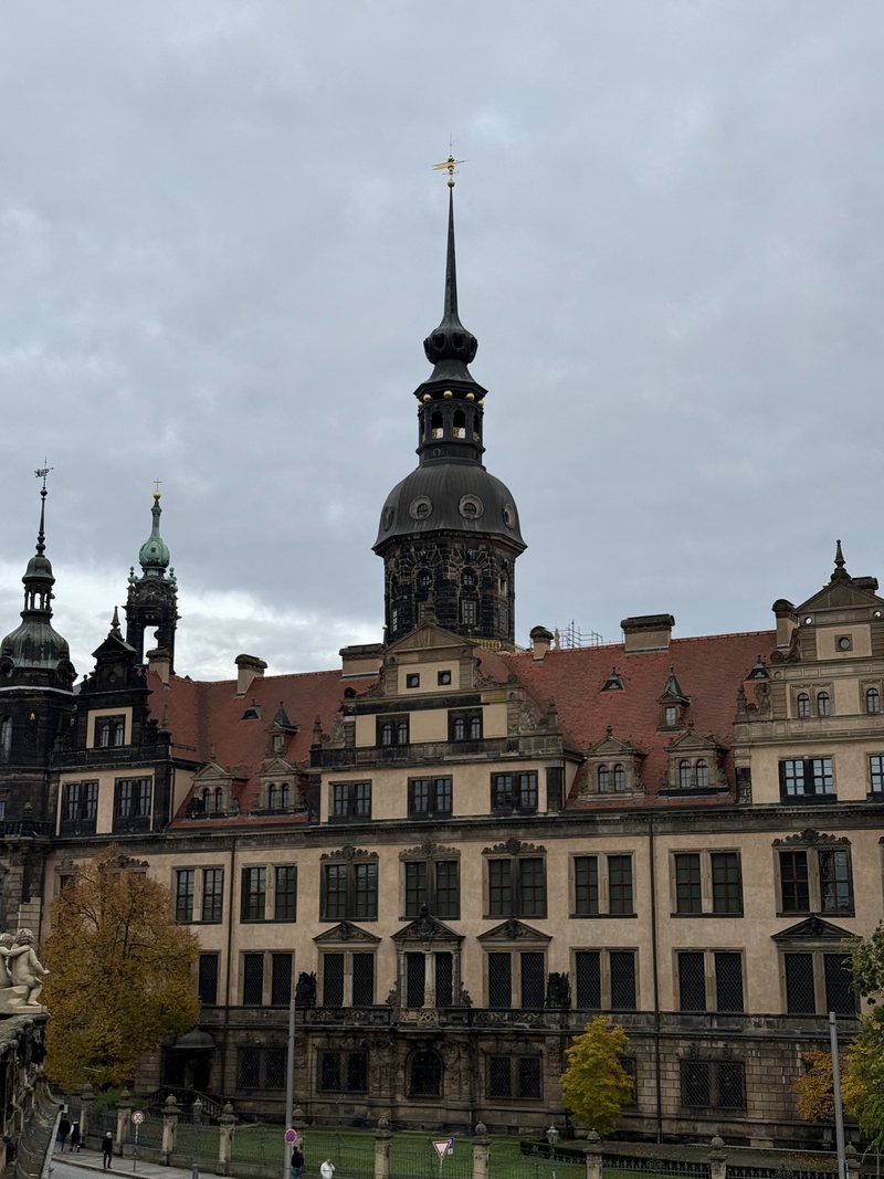 Dresden Castle tower under a soft grey sky